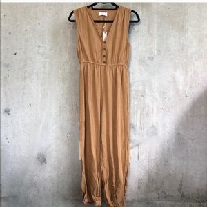 NWT roolee romper. Price is firm.